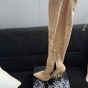 Thigh high heel